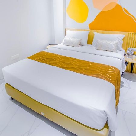 Genio Inn - Mantos Manado Bagian luar foto