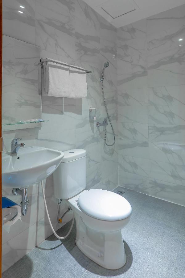 Genio Inn - Mantos Manado Bagian luar foto