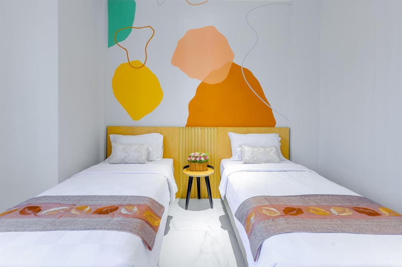 Genio Inn - Mantos Manado Bagian luar foto